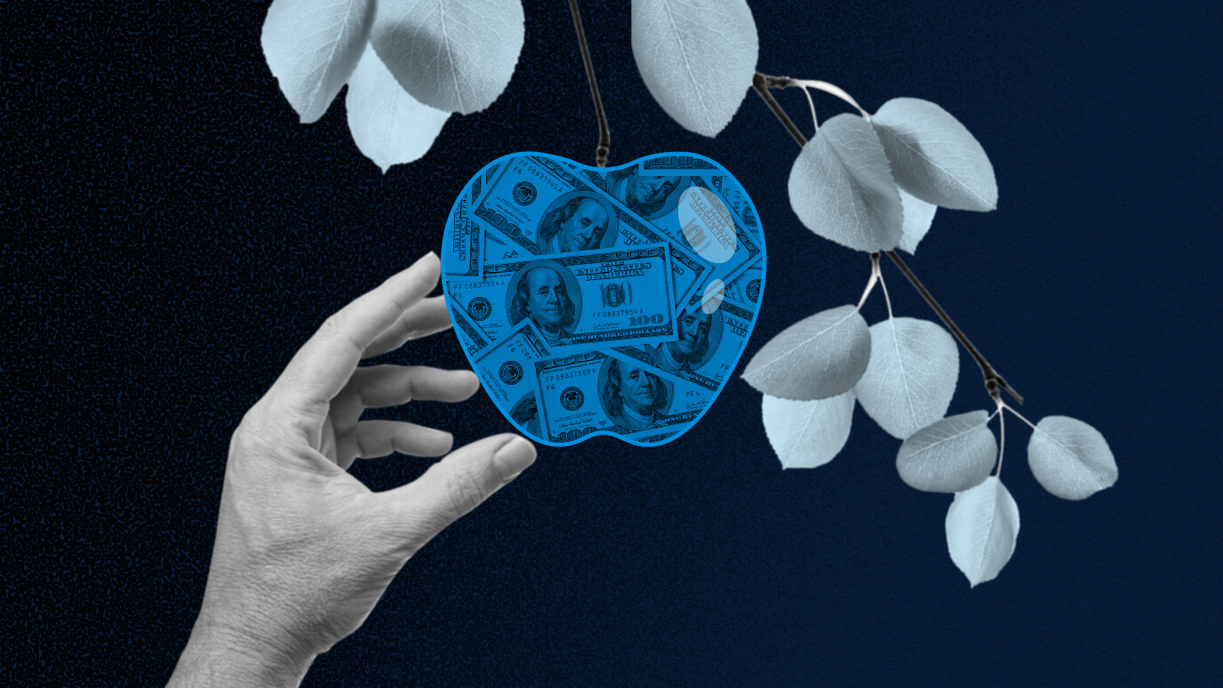 A hand is shown picking an illustrated apple filled with dollar bills from a tree.
