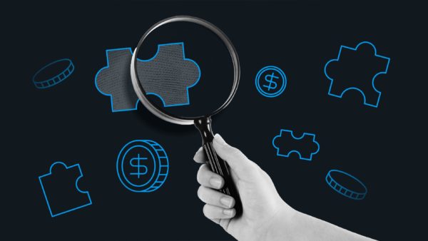 A hand is shown holding a magnifying glass to a puzzle piece, alluding to how the S&P 500 is an index that offers a closer look at the stock market as a whole.