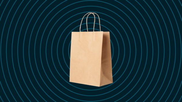 brown paper shopping bag to represent 'buying back' company stock through a stock buyback